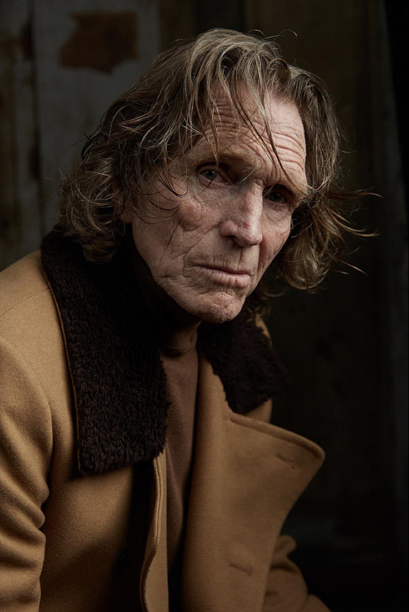Portrait of Joseph Lloyd Lopez in a camel coat with a shearling collar
